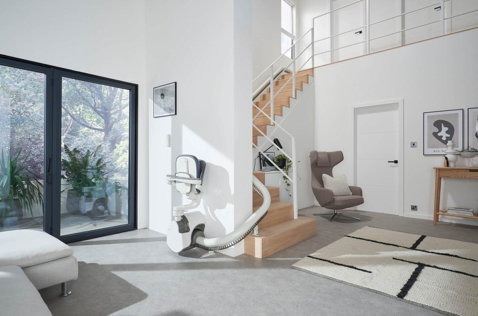Flow X curved stairlift installed on a staircase